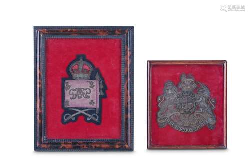 A SMALL 19TH CENTURY EMBROIDERED ROYAL COAT OF ARMS TOGETHER WITH AN EMBROIDERED MILITARY CLOTH BADGEthe coat of arms worked in silver and gilt thread on crimson ground