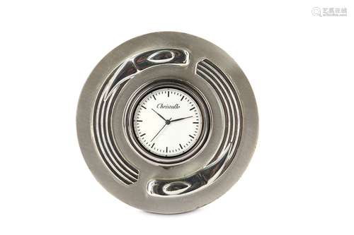 A FRENCH CHRISTOFLE SILVERED METAL DESK CLOCKof circular form with a flat base