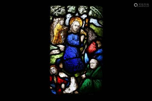 A LARGE STAINED AND LEADED GLASS WINDOW DEPICTING THE RESURRECTION OF CHRIST