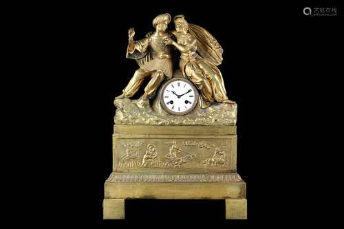 AN EARLY 19TH CENTURY FRENCH EMPIRE PERIOD GILT BRONZE FIGURAL MANTEL CLOCK WITH A COURTING COUPLE the stepped plinth base with relief cast decoration of a classical scene with Venus being pulled on a chariot with dolphins in the sea