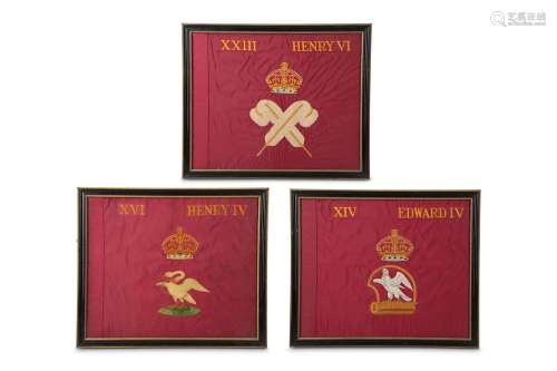 A SET OF THREE EARLY 20TH CENTURY FRAMED EMBROIDERED PENNANTS WITH ROYAL CRESTSeach folded over and revealing the same crest to each side of the double glazed frame