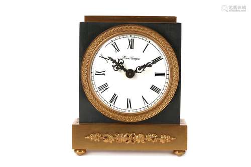 A LATE 20TH CENTURY GILT AND POLISHED BRASS DESK ALARM CLOCK BY HOUR LAVIGNEof square plinth form