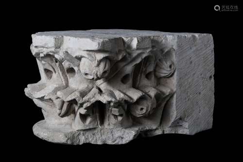 A FRENCH GOTHIC CARVED LIMESTONE CORBEL