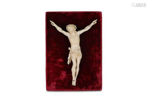 A 19TH CENTURY CARVED IVORY CORPUS CHRISTIthe crucifix figure of Christ depicted wearing the crown of thorns