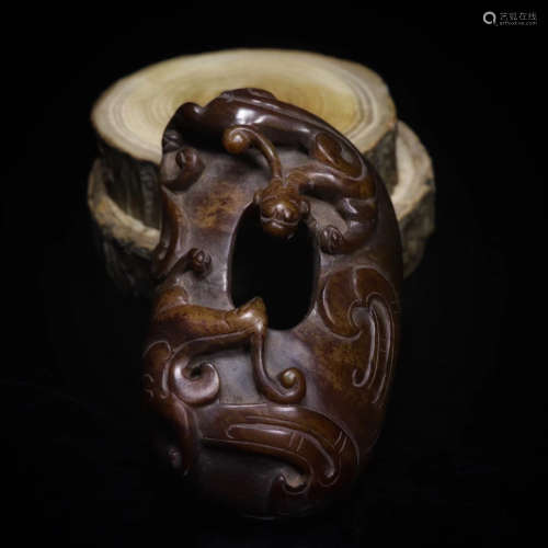 A DRAGON CARVED PENDANT