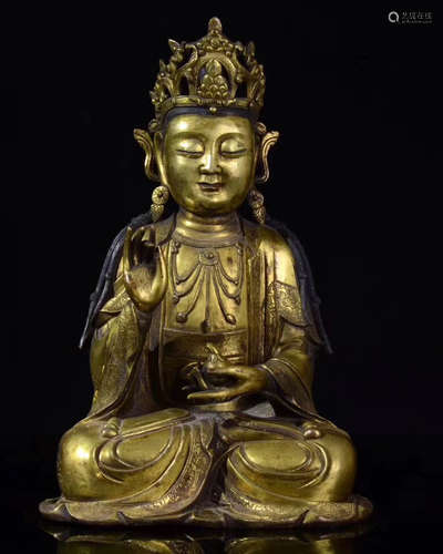 A GILT BRONZE BUDDHA SEATED FIGURE