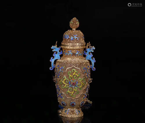 A GILT SILVER MOLDED VASE