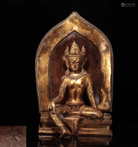 A GILT BRONZE MOLDED GUANYIN STATUE