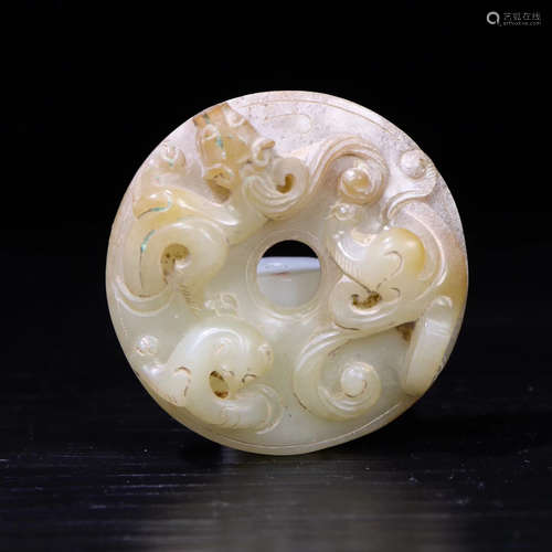 A HETIAN JADE DRAGON PENDANT