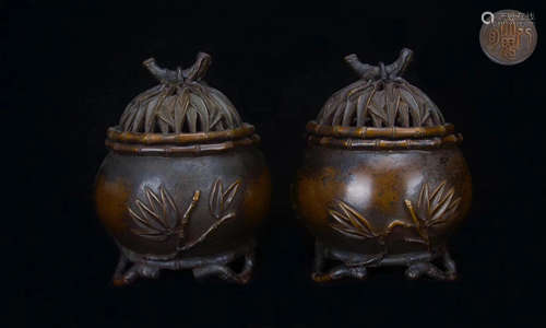 PAIR OF FETAL BRONZE TRIPOD INCENSORS