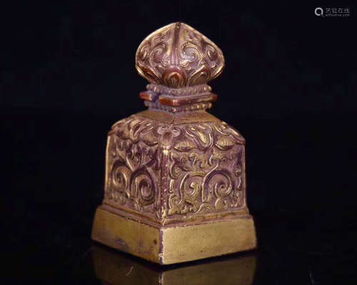 A GILT BRONZE MOLDED TIBET SEAL