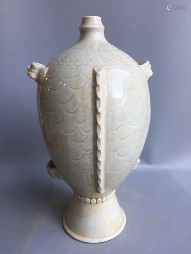 A FISH SHAPED VASE