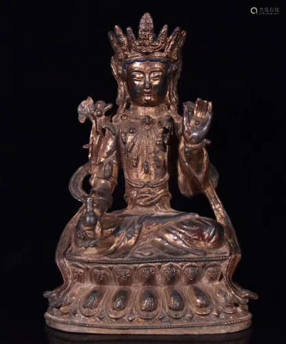 A GILT BRONZE MOLDED GUANYIN STATUE