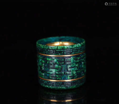 A JADE STONE CARVED ARCHER RING