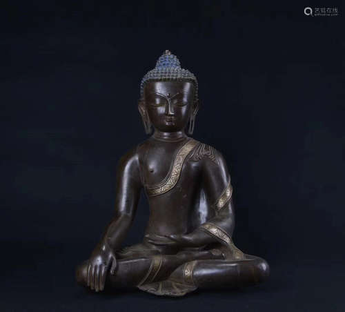 A BRONZE SAKYAMUNI BUDDHA FIGURE