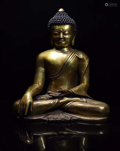 A GILT BRONZE BUDDHA FIGURE WITH QIANLONG MARK