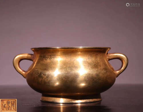 A GILT BRONZE MOLDED DOUBLE-EAR CENSER