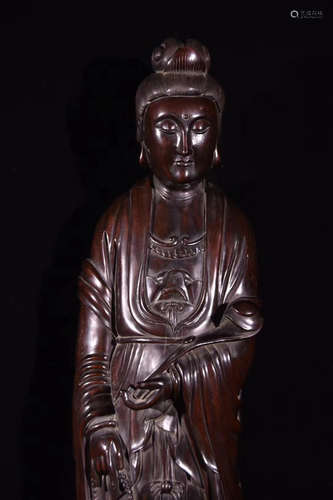 A ZITAN WOOD CARVED GUANYIN STATUE