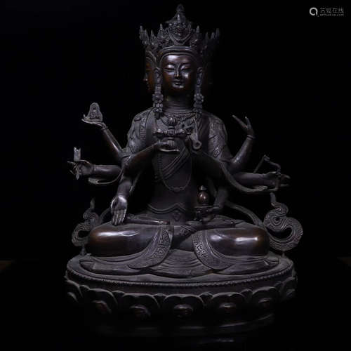 A BRONZE BRONZE GUANYIN FIGURE