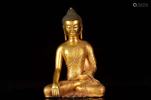 A BRONZE GILT BUDDHA FIGURE