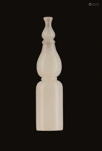 A WHITE JADE SNUFF BOTTLE, CONVERTED FROM A HOOKAH MOUT…