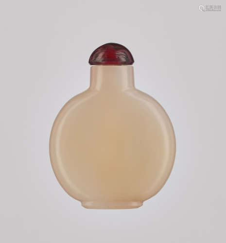 A GLASS 'JADE IMITATION' DISK SHAPED SNUFF BOTTLE, QING…