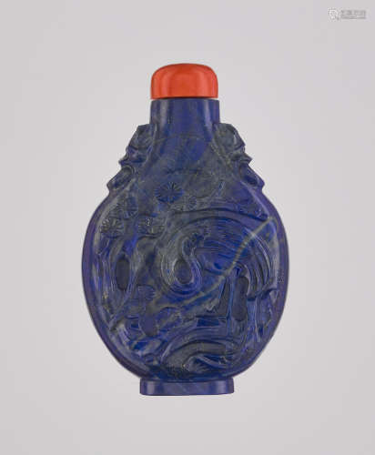 A LAPIS LAZULI ‘CRANE AND TREE’ SNUFF BOTTLE, QING DYNA…