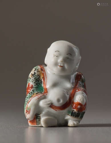 A PORCELAIN NETSUKE OF HOTEIPorcelain netsuke w...