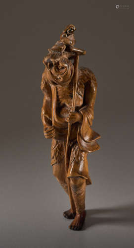 A TALL WOOD NETSUKE OF TEKKAI SENNINWood netsuk...