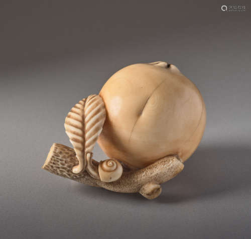 AN IVORY NETSUKE BY MITSUHIRO OF A BIWA FRUITIv...