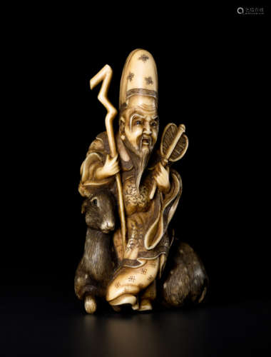 AN IVORY NETSUKE OF JUROJINIvory netsuke. Japan...