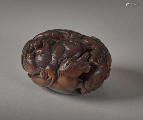 A WOOD NETSUKE BY MASAHIRO OF THE TWELVE ZODIAC AN...