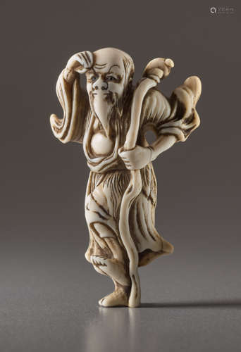 AN IVORY NETSUKE OF TEKKAI SENNINIvory netsuke....