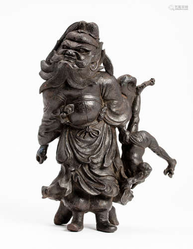 A SOLID IRON ‘OKIMONO ’ FIGURE OF A SHOKI AND ONI...