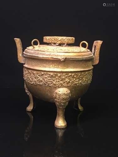 A GILT BRONZE TRIPOD CONTAINER, DING