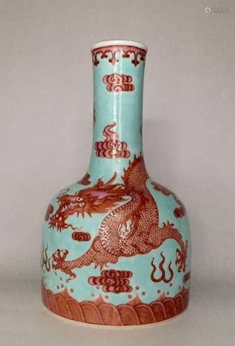 A BLUE GROUND AND CORAL RED 'DRAGON' BOTTLE VASE