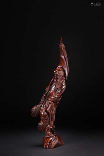 A Carved Hardwood Figure