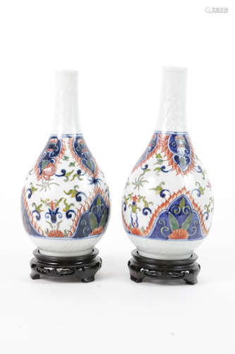 Pair of Chinese porcelain vases with bases