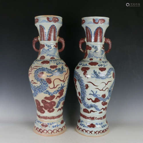 YUAN A PAIR OF BLUE AND WHITE UNDERGLAZED-RED VASES