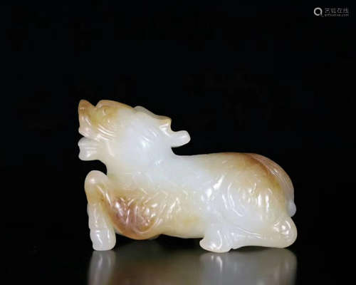 A HETIAN JADE QILIN ORNAMENT