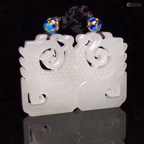 A PAIR OF HETIAN JADE DRAGON & PHOENIXPENDANT