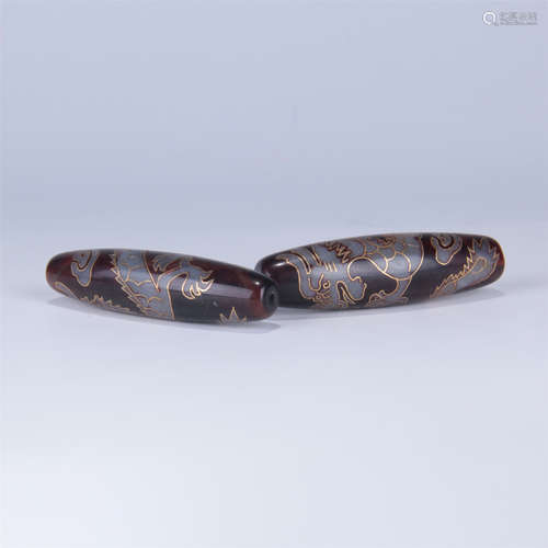 TWO TIBETAN DZI BEADS