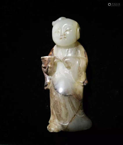 A JADE MOLDED BOY SHAPED FIGURE