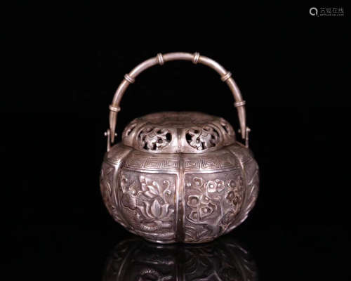 A SILVER MOLDED MELON SHAPED TEAPOT