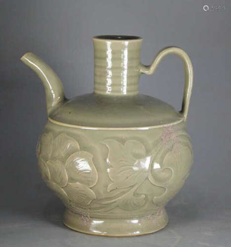 A CELADON FLORAL PATTERN EWER