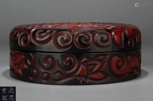 A RED LACQUER FLORAL PATTERN BOX