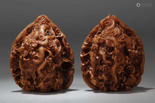 PAIR DRAGON DESIGN WALNUT CARVED ORNAMENT