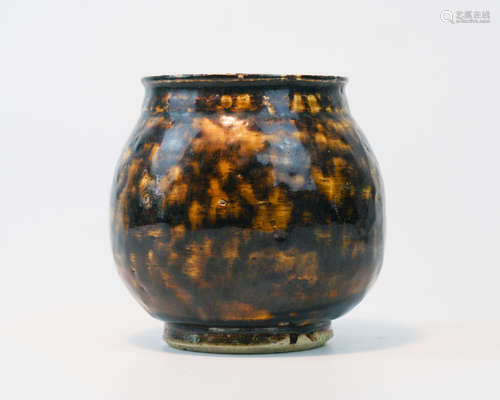 A TORTOISE SHELL PATTERN JAR