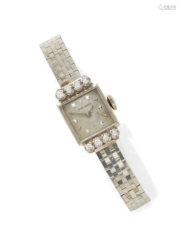 A lady's diamond and 14k white gold integral bracelet wristwatch, Movado