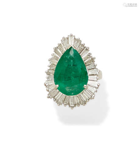 An emerald, diamond and platinum ring/pendant